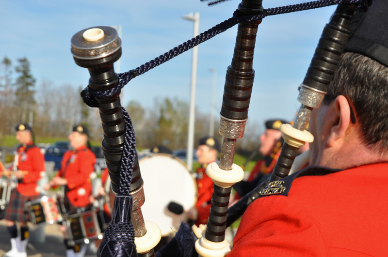 17 A bag piper plays in a procession